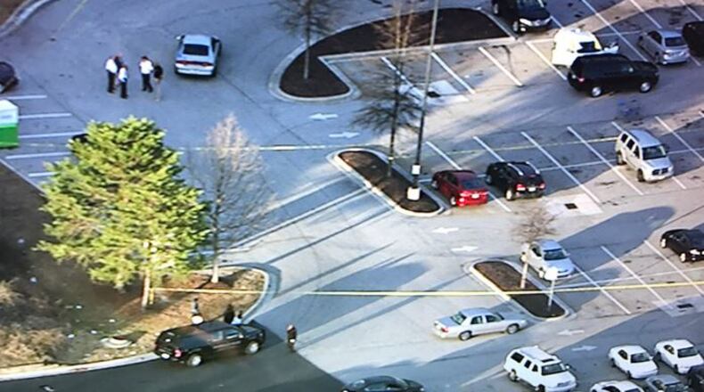 Two people were found shot to death Friday in a vehicle outside a Wal-Mart in Clayton County. (Credit: Channel 2 Action News)