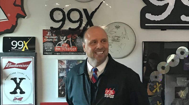 Christopher "Crash" Clark visiting 99X in 2017 when the station celebrated its 25th anniversary. (The station at the time was on 98.9 and was mostly playing new music without jocks but held a special anniversary party with the original Morning X staff.) RODNEY HO/rho@ajc.com