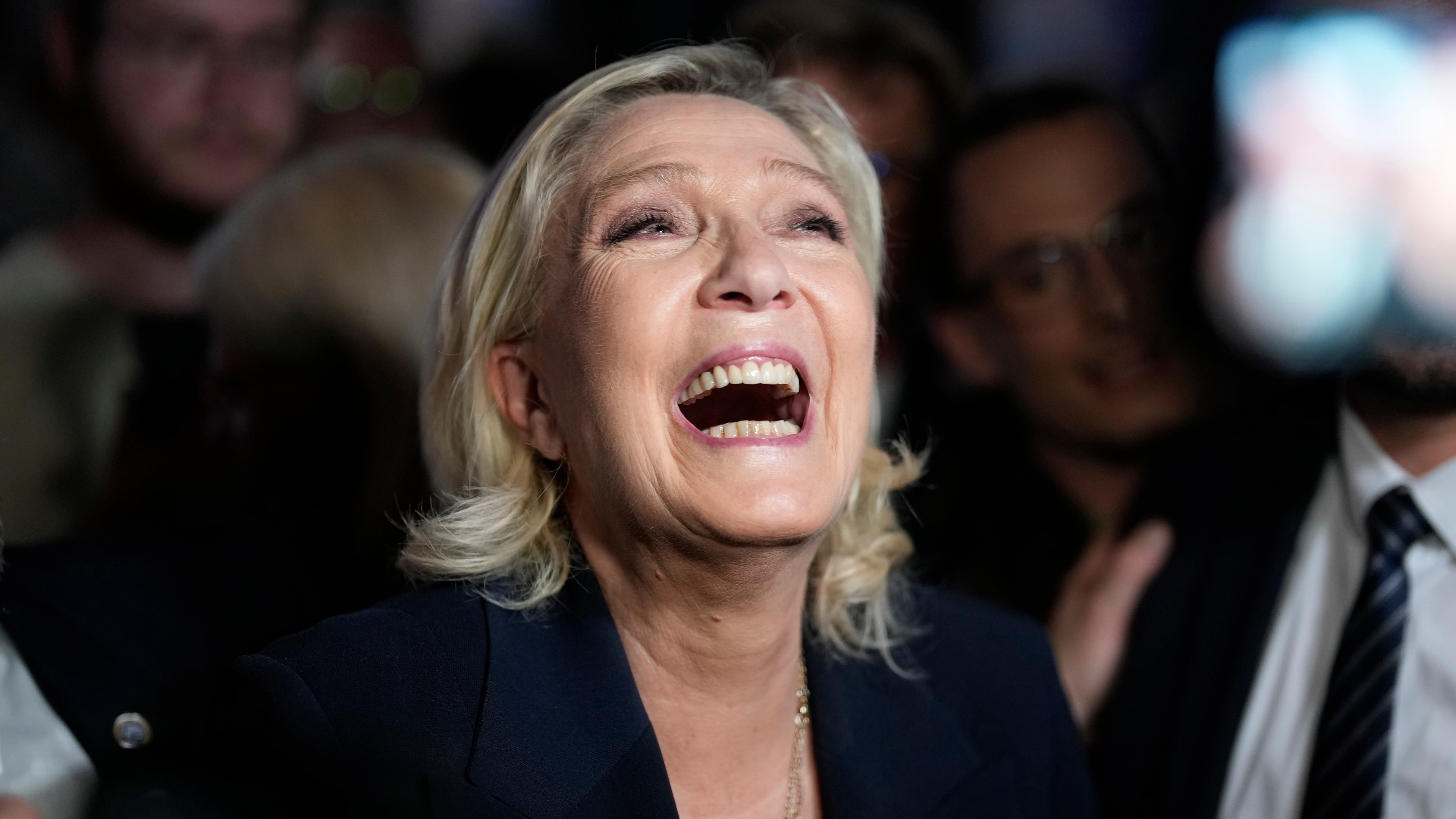 FILE - French far-right leader Marine Le Pen reacts as she meets supporters and journalists after the release of projections based on the actual vote count in select constituencies , Sunday, June 30, 2024 in Henin-Beaumont, northern France. (AP Photo/Thibault Camus, File)