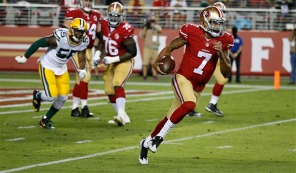 San Francisco 49ers quarterback Colin Kaepernick runs with the ball during the first half of an NFL preseason football game against the Green Bay Packers Friday, Aug. 26, 2016, in Santa Clara, Calif. (AP Photo/Tony Avelar)