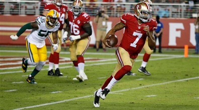 San Francisco 49ers quarterback Colin Kaepernick runs with the ball during the first half of an NFL preseason football game against the Green Bay Packers Friday, Aug. 26, 2016, in Santa Clara, Calif. (AP Photo/Tony Avelar)
