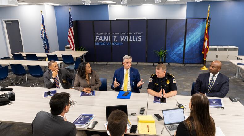 (L-R) Fulton County Sheriff Patrick Labat, District Attorney Fani Willis, Atlanta Police Foundation President Dave Wilkinson, Atlanta Police Chief Darin Schierbaum, and U.S. Attorney Ryan Buchanan appear for a press interview at the district attorney’s office in Atlanta on Friday, July 12, 2024. The public safety officials presented findings from a report on repeat offenders. (Arvin Temkar / AJC)