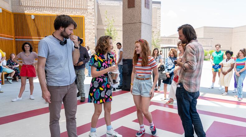 Ross Duffer, Millie Bobby Brown, Sadie Sink and Matt Duffer shooting season three of "Stranger Things" in metro Atlanta. NETFLIX