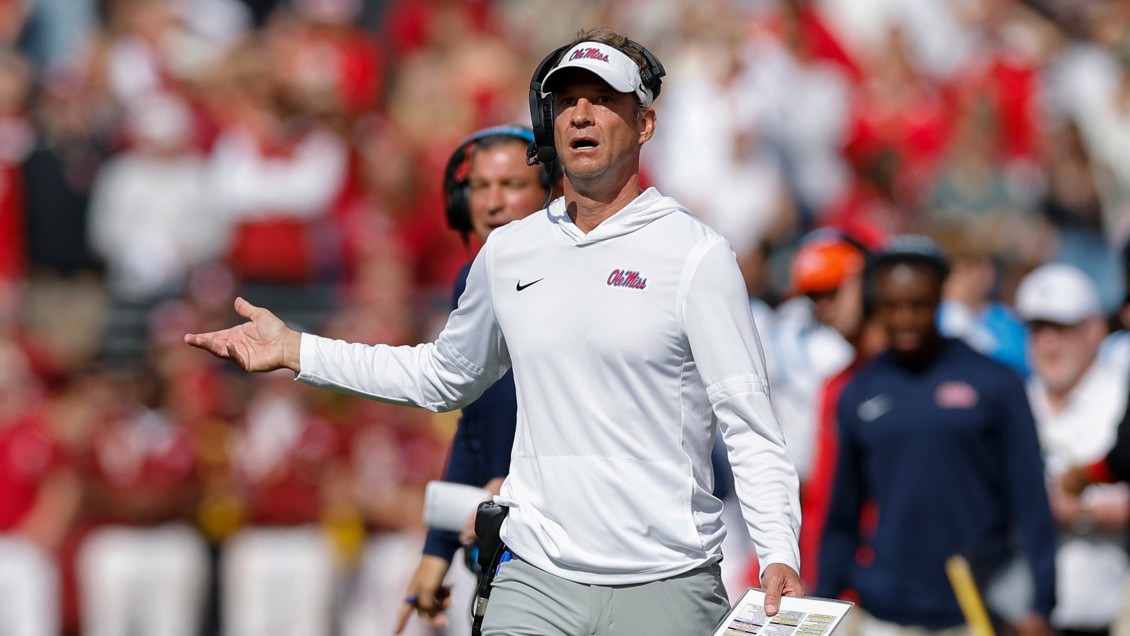 Ole Miss coach Lane Kiffin has led the Rebels into position to make the College Football Playoff, and some also consider him the leading candidate for the vacant coaching job at Florida. (Alonzo Adams/AP)