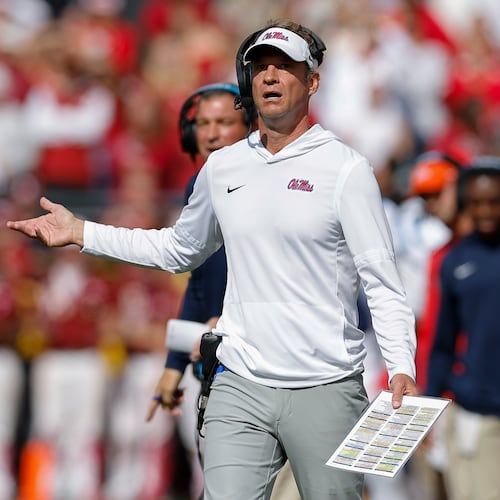 Ole Miss coach Lane Kiffin has led the Rebels into position to make the College Football Playoff, and some also consider him the leading candidate for the vacant coaching job at Florida. (Alonzo Adams/AP)