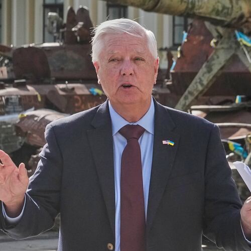 U.S. Sen. Lindsey Graham, R-S.C. answers a question from a media member near damaged Russian vehicles on display in central Kyiv, Ukraine, Friday, July 10, 2026. (AP Photo/Efrem Lukatsky)