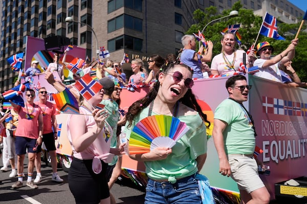 Members of Nordic for Equality march during the World Pride parade, Saturday, June 7, 2025, in Washington. (AP Photo/Mark Schiefelbein)
