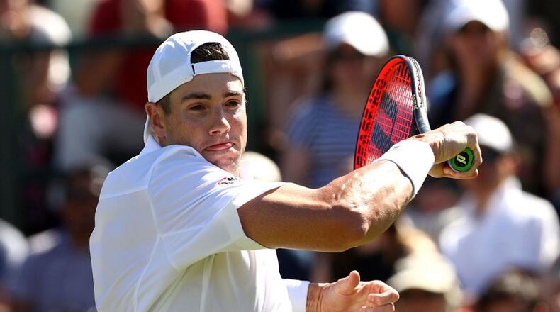 John Isner of the United States plays a shot during his Men's Singles first round match against Yannick Maden of Germany on day one of the Wimbledon Lawn Tennis Championships at All England Lawn Tennis and Croquet Club on July 2, 2018 in London, England. (Photo by Matthew Stockman/Getty Images)