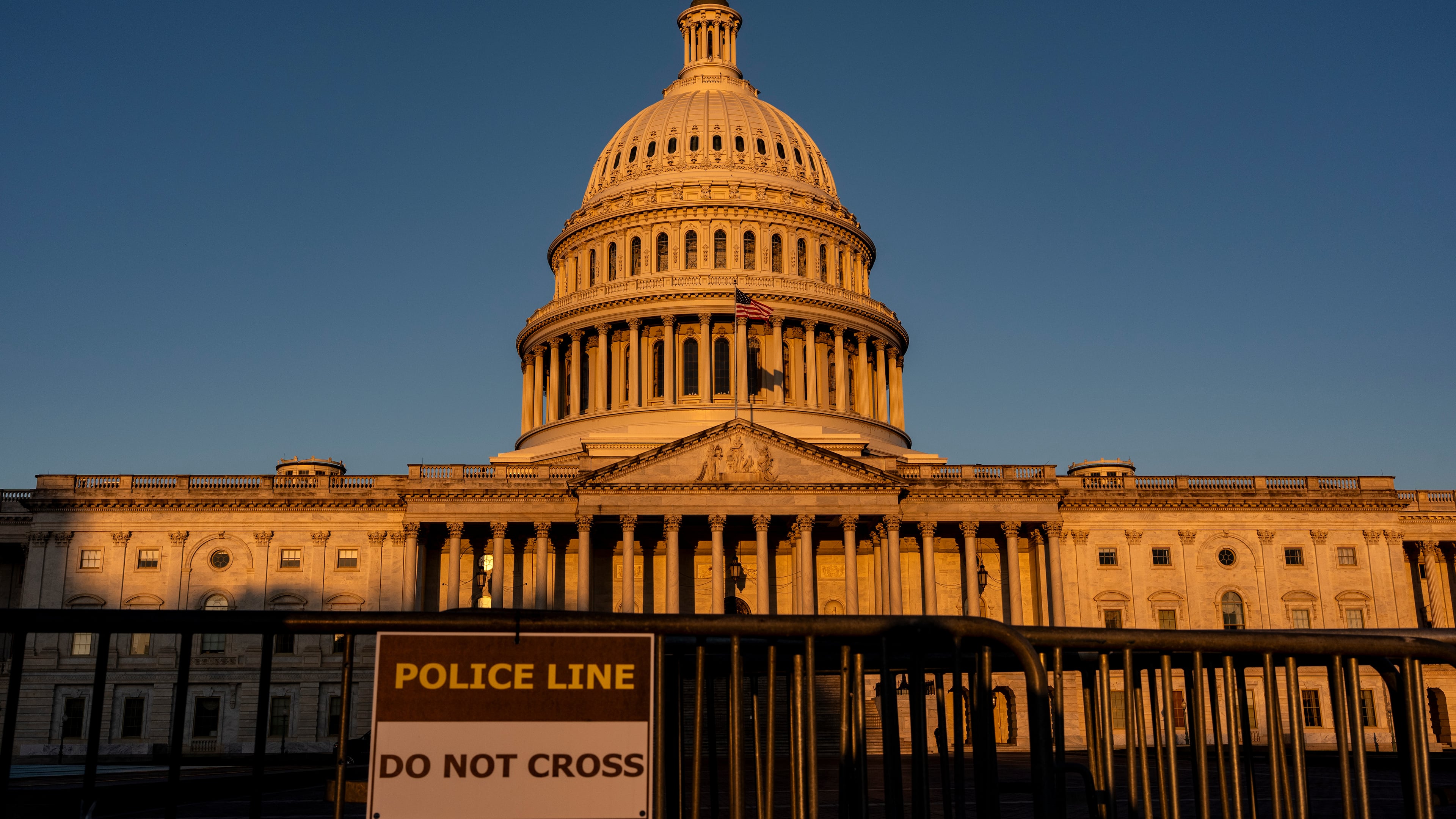 The Capitol is illuminated at dawn in Washington, Monday, Oct. 6, 2025. (AP Photo/J. Scott Applewhite)