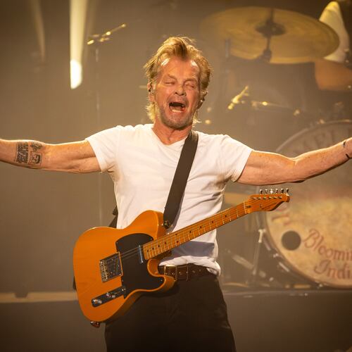 John Mellencamp visited America Bank Amphitheatre in Alpharetta on Saturday, Aug. 1 on his Dancing Words tour Saturday night. Split into two acts, with a 15-minute intermission, Mellencamp played 24 songs including all his top 10 hits for a sold-out crowd. (RYAN FLEISHER FOR THE ATLANTA JOURNAL-CONSTITUTION)