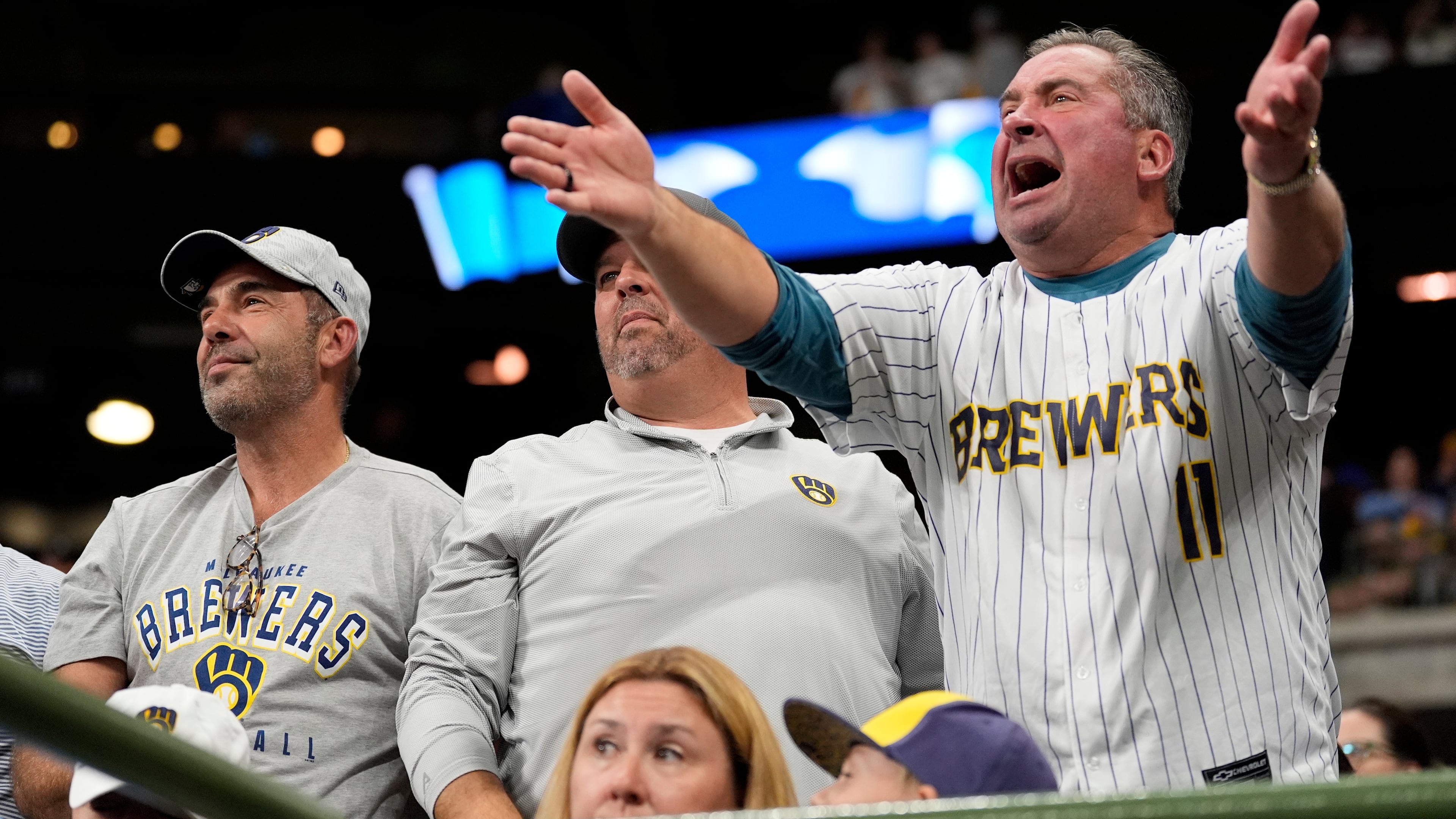 Milwaukee Brewers fans react during the sixth inning in Game 2 of baseball's National League Championship Series against the Los Angeles Dodgers, Tuesday, Oct. 14, 2025, in Milwaukee. (AP Photo/Brynn Anderson)