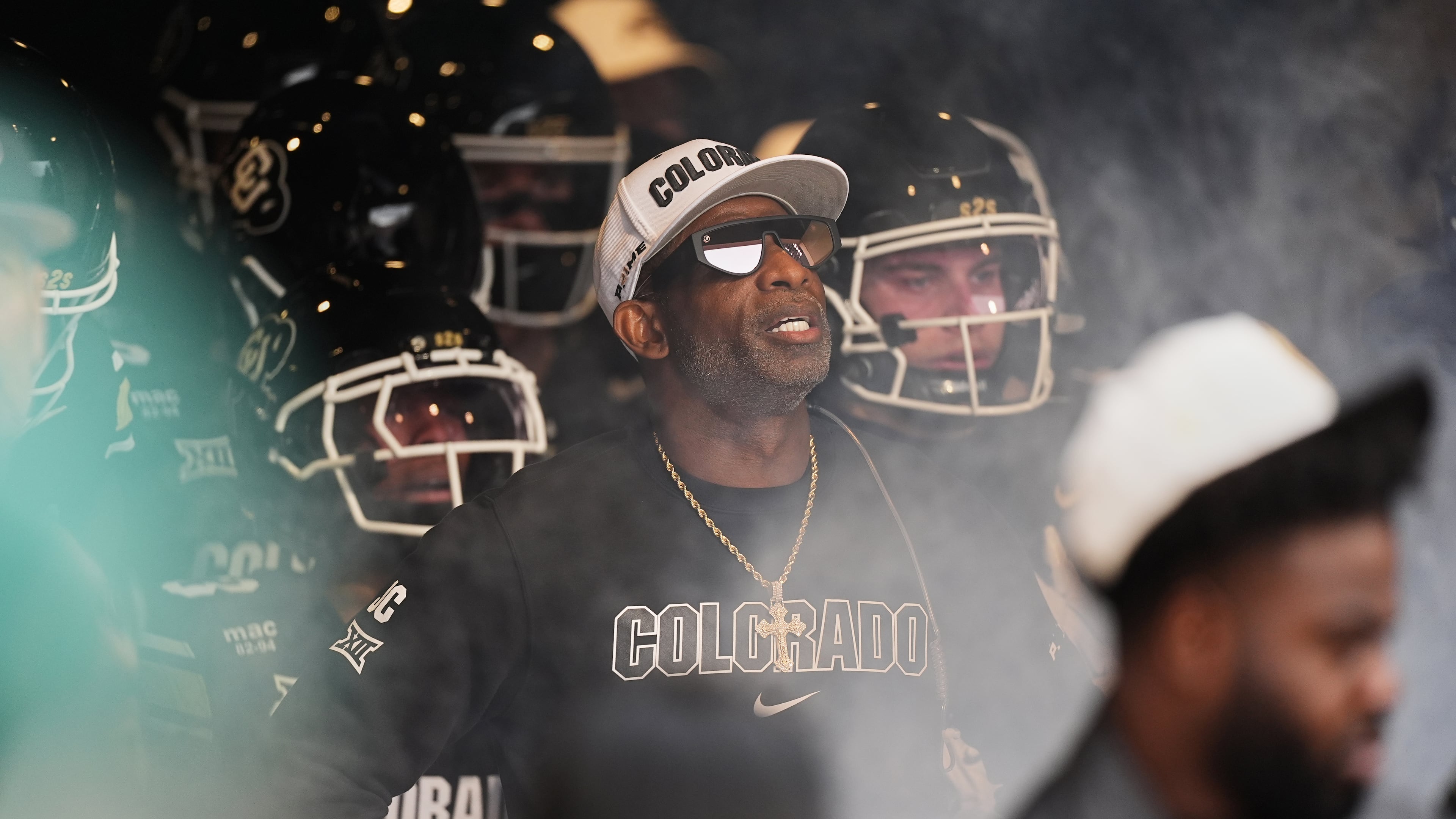 Colorado head coach Deion Sanders waits to take the field with players ahead of an NCAA college football game against Iowa State, Saturday, Oct. 11, 2025, in Boulder, Colo. (AP Photo/David Zalubowski)