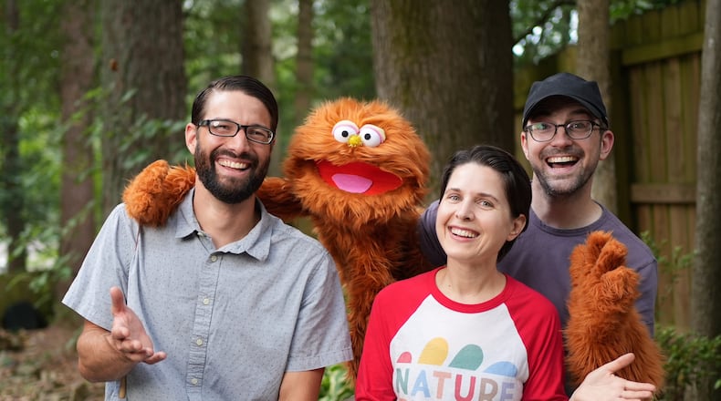 Three friends in Decatur decided to combine their talents and create a children's nature series, "Nature Time": Michael Martin (left), a college biology professor; learning designer Elise Potts (center); and cinematographer Alan Melling (right), who also brings the puppet Garbanzo to life.