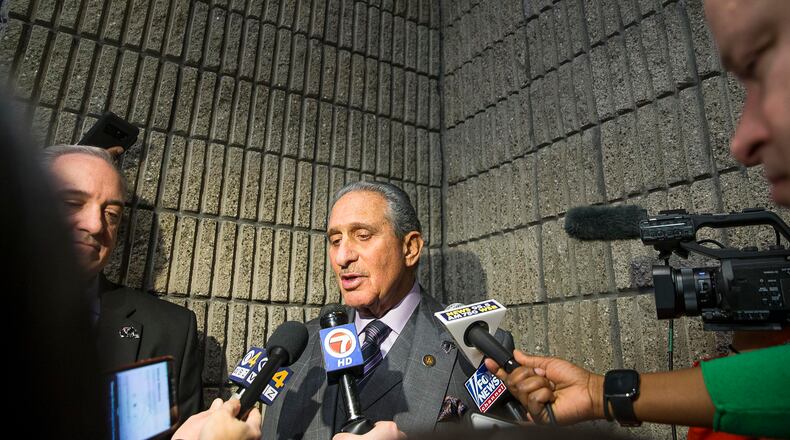 Atlanta Falcons owner Arthur Blank (center) answers questions during a media scrum following a 'Welcome to Super Bowl LIII' press conference at the Georgia World Congress Center in Atlanta, Monday, January 28, 2019. (ALYSSA POINTER/ALYSSA.POINTER@AJC.COM)