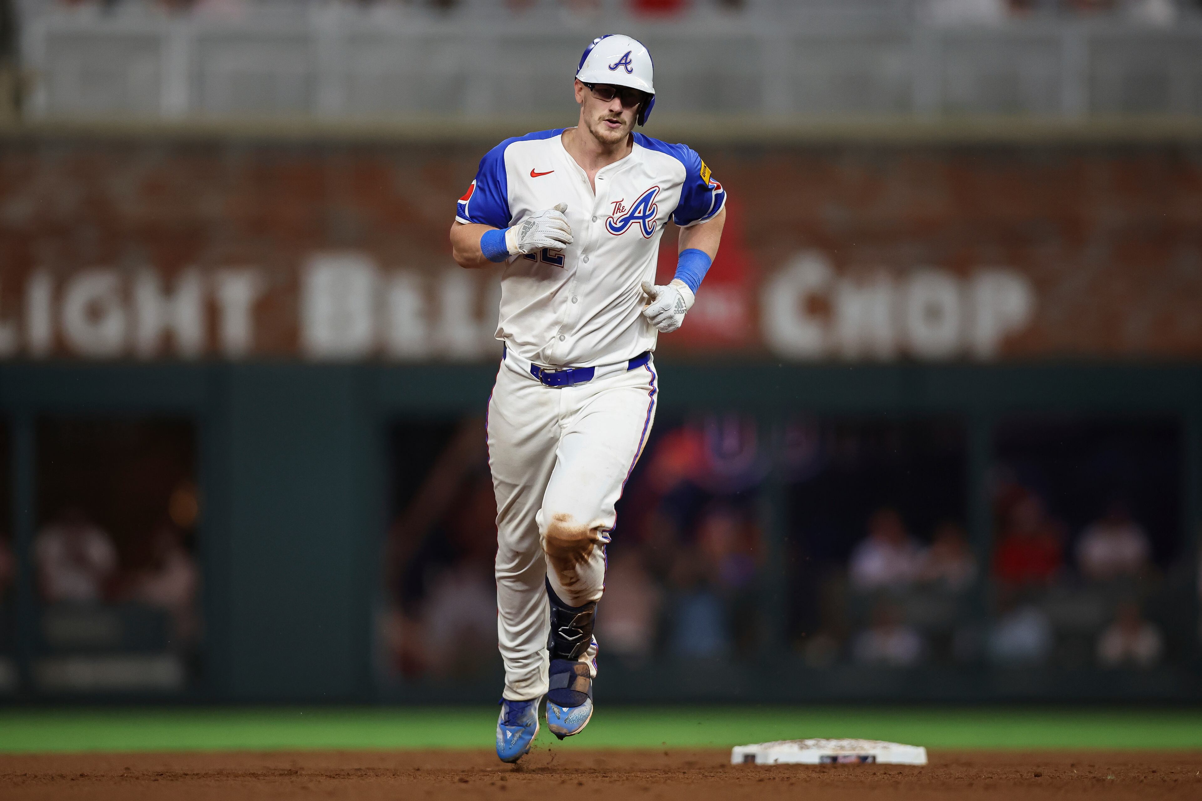 Atlanta Braves' Sean Murphy (12) rounds second base after hitting a grand slam in the seventh inning of a baseball game against the Philadelphia Phillies, Saturday, June 28, 2025, in Atlanta. (AP Photo/Colin Hubbard)