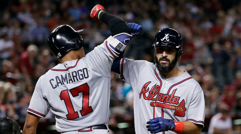 The emergence of rookie Johan Camargo was part of the reason that Sean Rodriguez (right) became expendable to the Braves, who traded him Saturday to the Pirates for a first base/outfield prospect. (AP Photo/Matt York)