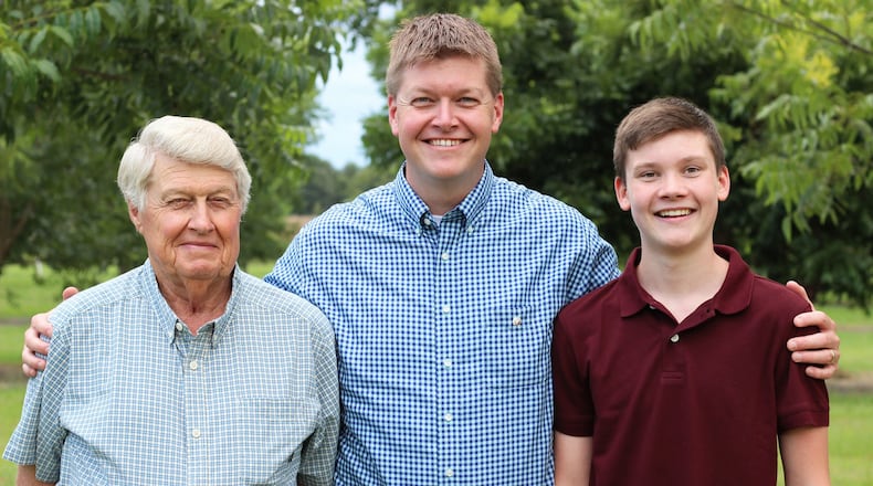 Roy Goodson (left) and his son David Goodson are hoping David’s son Drew one day will take the reins at Goodson Pecans. CONTRIBUTED BY SARAH PRICE