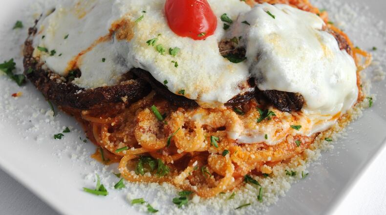 La Parmigiana- choice of eggplant, chicken or veal, served with spaghetti and marinara sauce at Mezza Luna. (BECKY STEIN PHOTOGRAPHY)