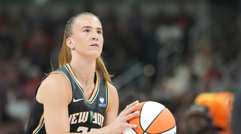 FILE - New York Liberty's Sabrina Ionescu shoots during the 3-point contest at the WNBA All-Star basketball weekend, July 18, 2025, in Indianapolis. (AP Photo/Michael Conroy, File)