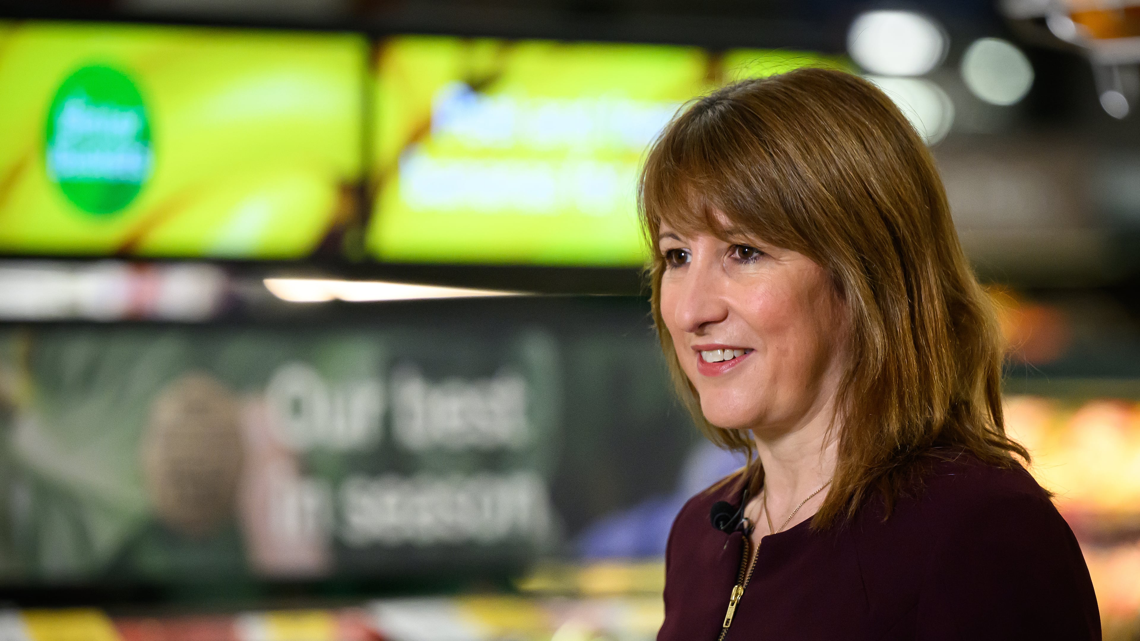 British Chancellor of the Exchequer Rachel Reeves speaks to the media during a visit to a branch of the Tesco supermarket chain in London, Wednesday Nov. 19, 2025 in. (Leon Neal/Pool Photo via AP)