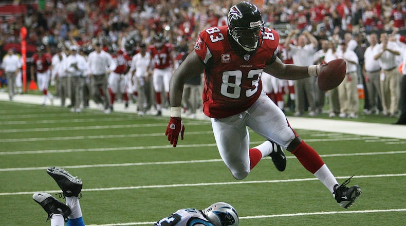 Falcons tight end Alge Crumpler scores against the Panthers in their 2007 game at the Georgia Dome. CURTIS COMPTON / Staff