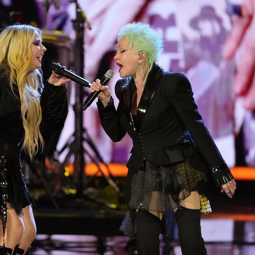 Avril Lavigne, left and Cyndi Lauper perform during the 2025 Rock and Roll Hall of Fame Induction Ceremony on Saturday, Nov. 8, 2025, at L.A. Live in Los Angeles. (AP Photo/Chris Pizzello)