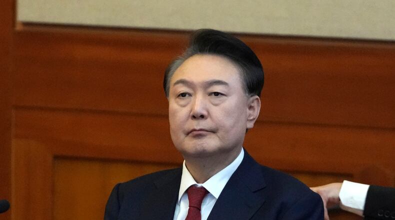 FILE - South Korea's impeached President Yoon Suk Yeol attends a hearing of his impeachment trial at the Constitutional Court in Seoul, South Korea, on Feb. 11, 2025. (AP Photo/Lee Jin-man, Pool, File)