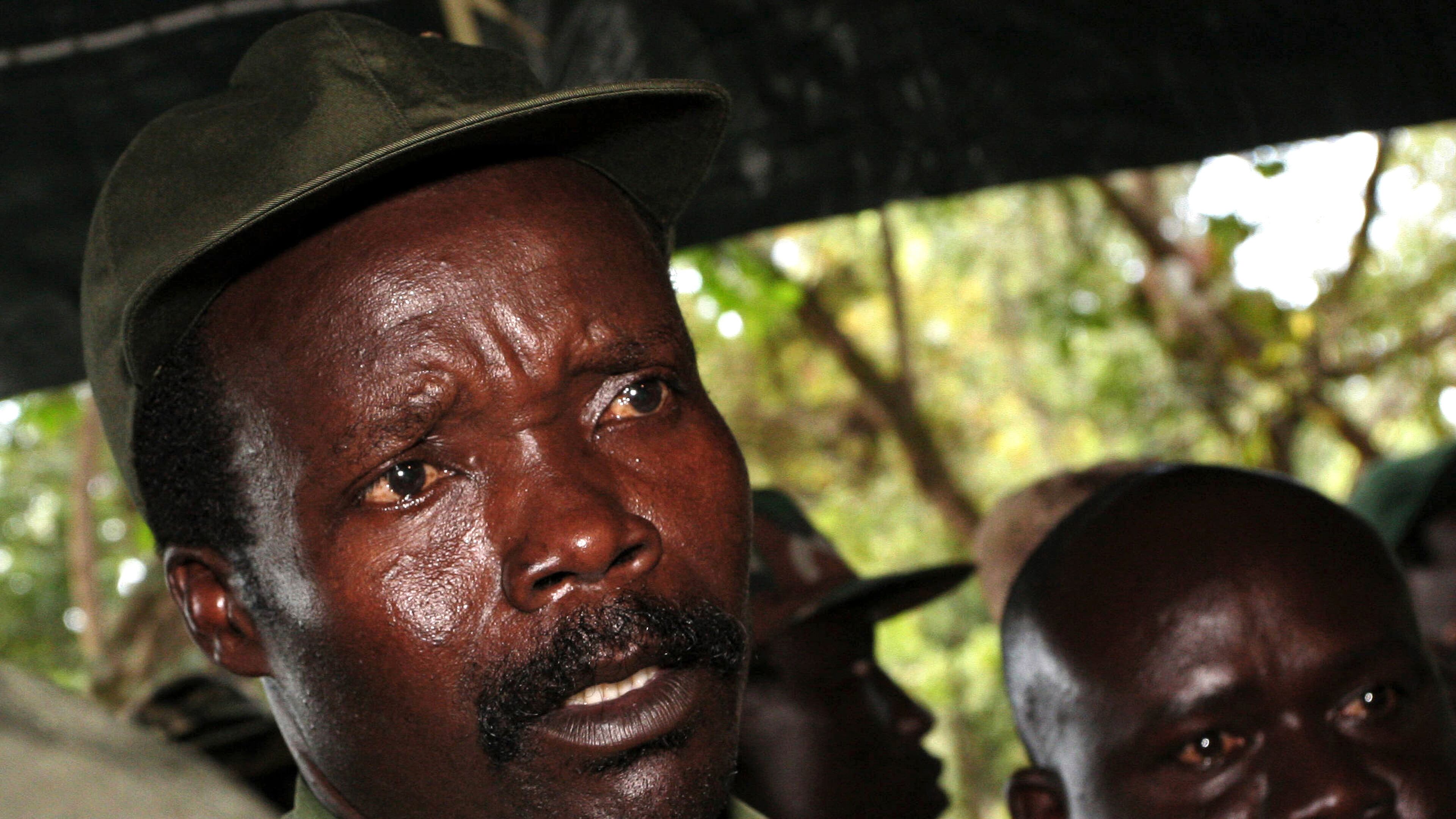 FILE - In this Nov. 12, 2006 file photo, the leader of the Lord's Resistance Army Joseph Kony answers journalists' questions following a meeting with UN humanitarian chief Jan Egeland at Ri-Kwangba in Southern Sudan. (AP Photo/Stuart Price, File)