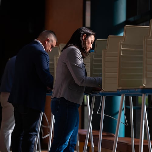 Denise Powell, candidate for the Democratic nomination to the House of Representatives in Nebraska's second district, votes in the Nebraska Primary Election at Omaha Community Playhouse Tuesday, May 12, 2026, in Omaha, Neb. (AP Photo/Rebecca S. Gratz)
