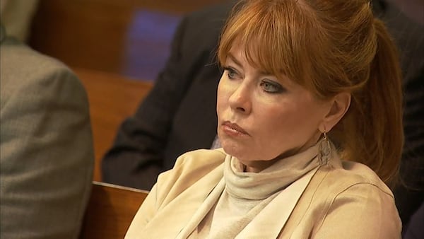 Dani Jo Carter listens as the judge tosses out two counts of influencing witnesses, during Tex McIver's murder trial on April 11, 2018 at the Fulton County Courthouse. (Channel 2 Action News)