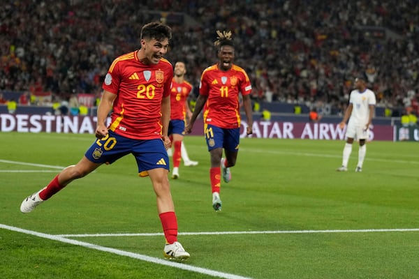 Spain's Pedri celebrates after scoring during the Nations League semifinal soccer match between Spain and France in Stuttgart, Germany, Thursday, June 5, 2025. (AP Photo/Matthias Schrader)