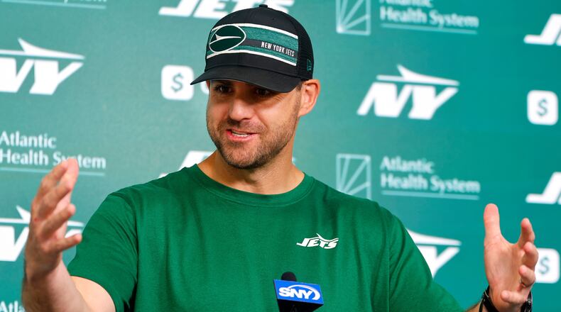FILE - New York Jets offensive coordinator Tanner Engstrand answers questions from media at NFL minicamp football, June 11, 2025, in Florham Park, N.J. (AP Photo/Noah K. Murray, File)