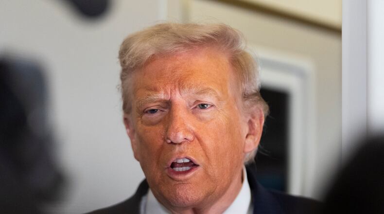 President Donald Trump speaks to the media after boarding Air Force One at Joint Base Andrews, Md., Friday, Oct. 31, 2025, enroute to Florida. AP Photo/Manuel Balce Ceneta)