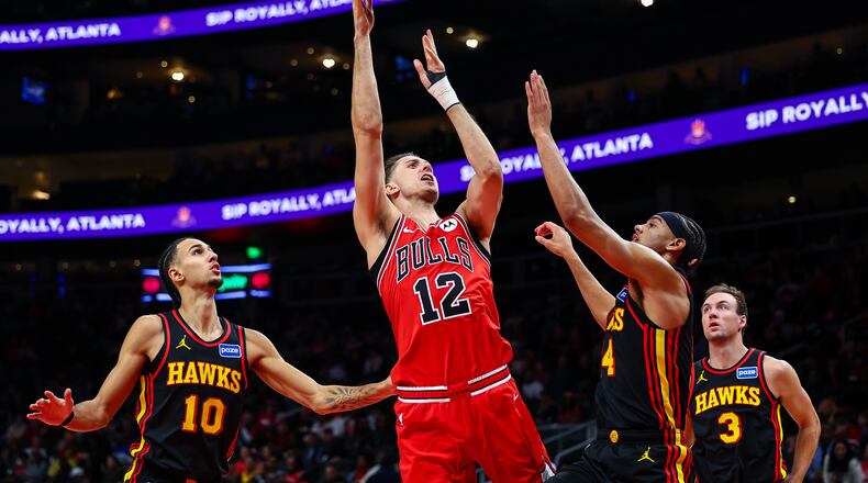 The Hawks lost their third straight game on Sunday at State Farm Arena to the Chicago Bulls, 152-150. Jalen Johnson had 36 points to lead all scorers, while Trae Young added 35 points. (Colin Hubbard/AP)