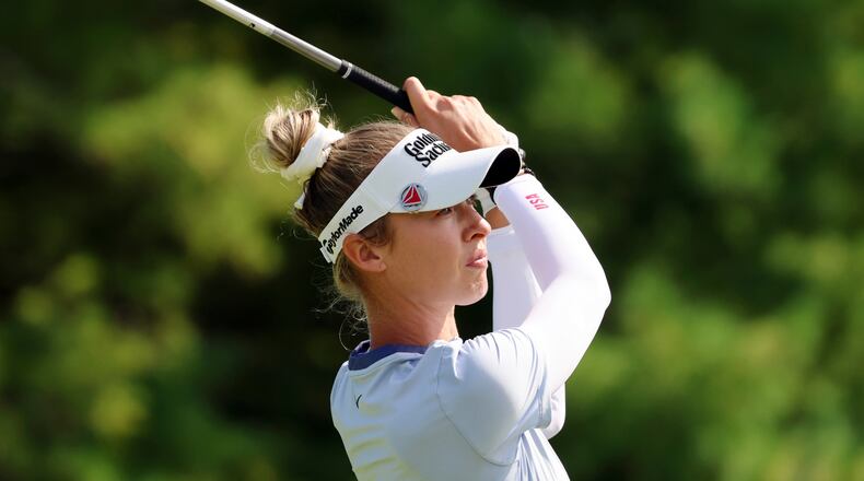 FILE - Nelly Korda hits from the third tee during the first round of the FM Championship LPGA golf tournament at TPC Boston, Thursday, Aug. 28, 2025, in Norton, Mass. (AP Photo/Michael Dwyer, File)