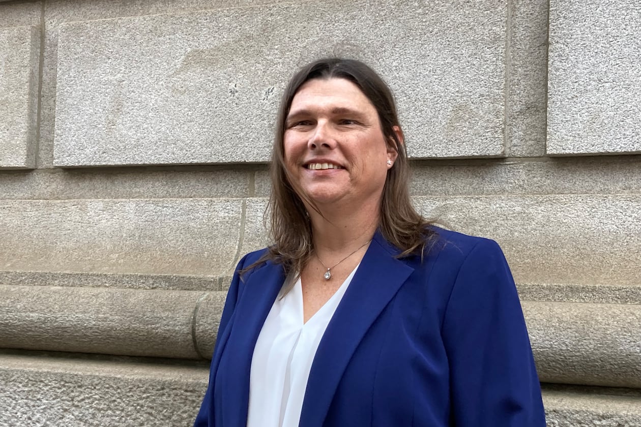 Sgt. Anna Lange, pictured outside the 11th Circuit courthouse in Atlanta in February 2025, has settled her landmark transgender rights case against Houston County and its sheriff. (Rosie Manins/AJC)
