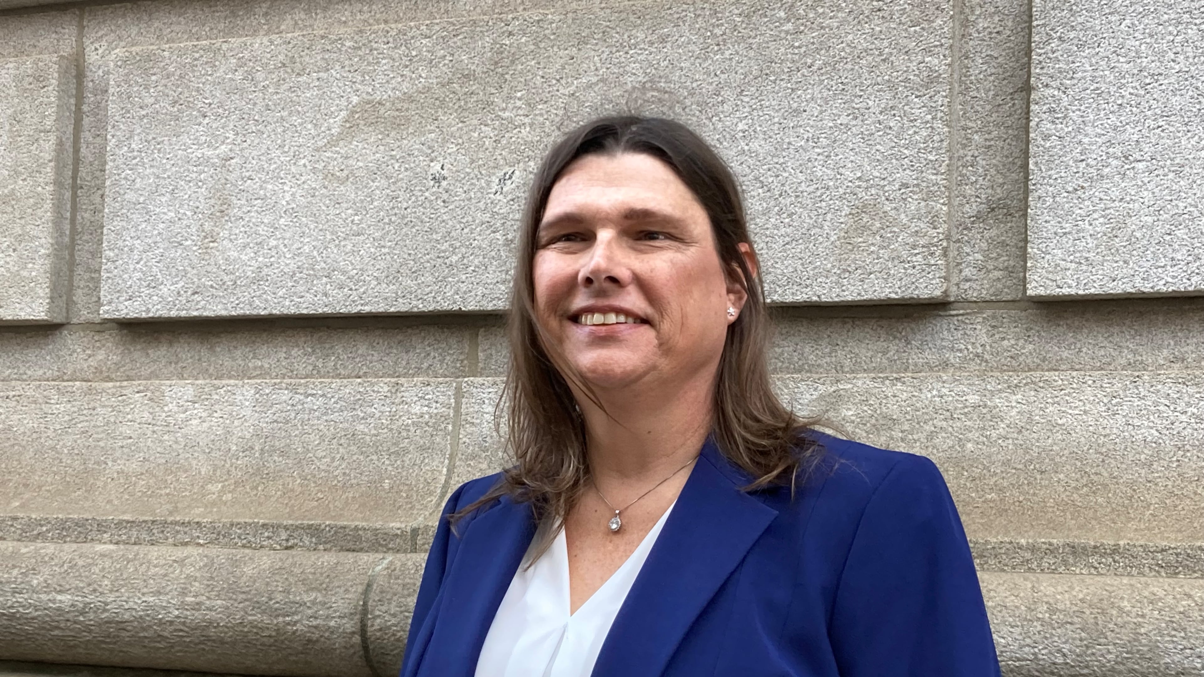 Houston County sheriff's deputy Anna Lange outside the U.S. Court of Appeals for the 11th Circuit in Atlanta on Tuesday, Feb. 4, 2025. The court ruled Tuesday that the county's insurance plan for employees, which excludes coverage for sex change surgery, does not violate the Civil Rights Act. (Rosie Manins / AJC)