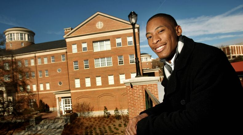 110107 Athens; University of Georgia President of Student Body Josh Delaney, 21, of Fayetteville, is shown next to the Miller Learning Center on the UGA campus Friday afternoon in Athens, Ga., Jan. 7, 2011. Jan. 9th is the anniversary of the day two first two African-Americans registered for classes at UGA. Black students now make up about 8 percent of the population at UGA and we talk with students, professors and administrators about attitudes and climate on campus. Delaney is the third African-American UGA student body president. Jason Getz jgetz@ajc.com