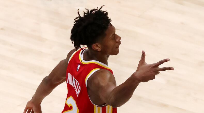 012721 Atlanta: Atlanta Hawks forward De’Andre Hunter reacts to hitting a three against the Brooklyn Nets in an NBA basketball game on Wednesday, Jan. 27, 2021, in Atlanta. Curtis Compton / Curtis.Compton@ajc.com”