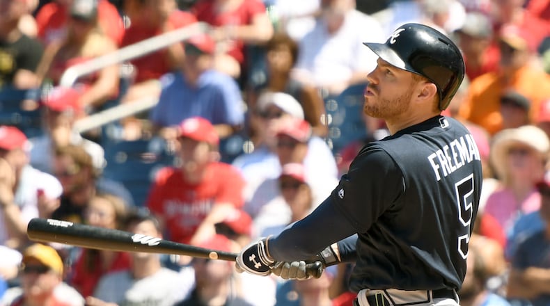 Freddie Freeman hits a three-run homer in the Braves’ final game before the All-Star break in Washington.  (Photo by Mitchell Layton/Getty Images)