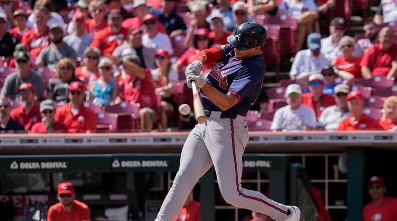 Atlanta Braves' Matt Olson hits a solo home run during the second inning of a baseball game against the Cincinnati Reds, Thursday, Sept. 19, 2024, in Cincinnati. (AP Photo/Joshua A. Bickel)