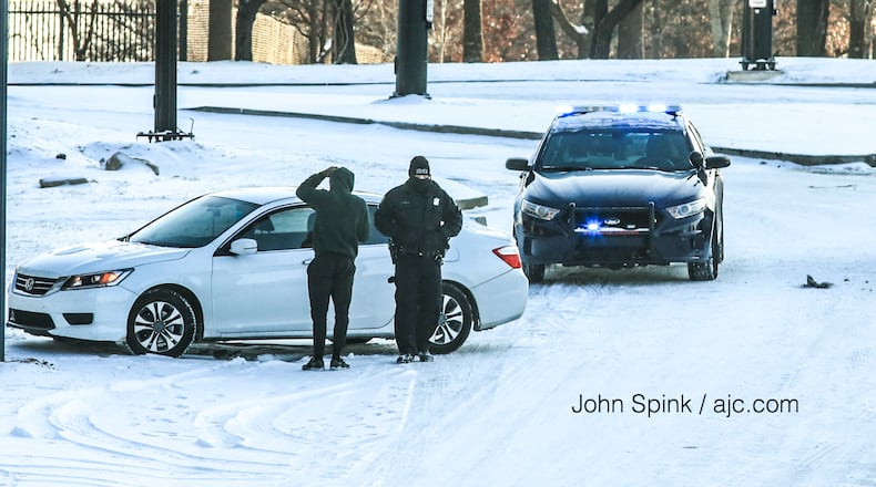 Snow on the roads in Atlanta made travel difficult Wednesday.