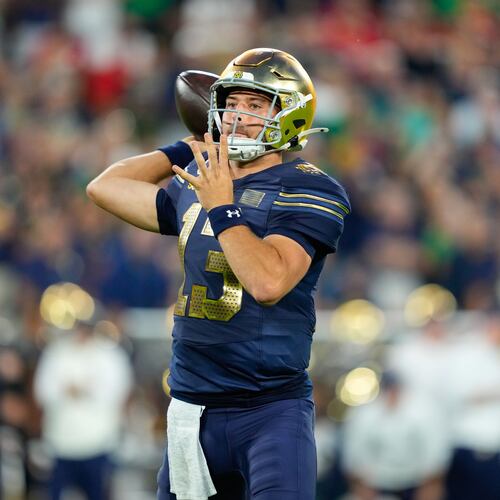 Notre Dame quarterback CJ Carr throws during the first half of an NCAA college football game against Wisconsin Sunday, Sept. 6, 2026, in Green Bay, Wis. (AP Photo/Kayla Wolf)