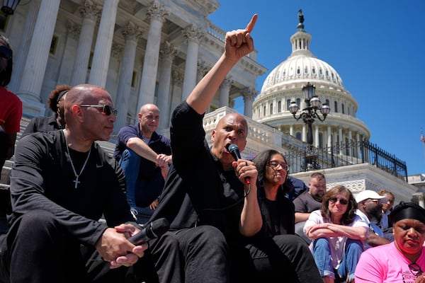 House Minority Leader Hakeem Jeffries (left), D-N.Y., and U.S. Sen. Cory Booker (speaking), D-N.J., participated in a live-streamed conversation on the steps of the Capitol on Sunday in Washington.