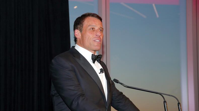 FILE PHOTO: Lifetime Achievement Award Honoree Tony Robbins speaks onstage at the 2017 Graduation Gala to benefit Happy Hearts Fund held at Aspire at One World Trade Center Observatory on June 7, 2017 in New York City.  (Photo by Paul Zimmerman/Getty Images for  Happy Hearts Fund)