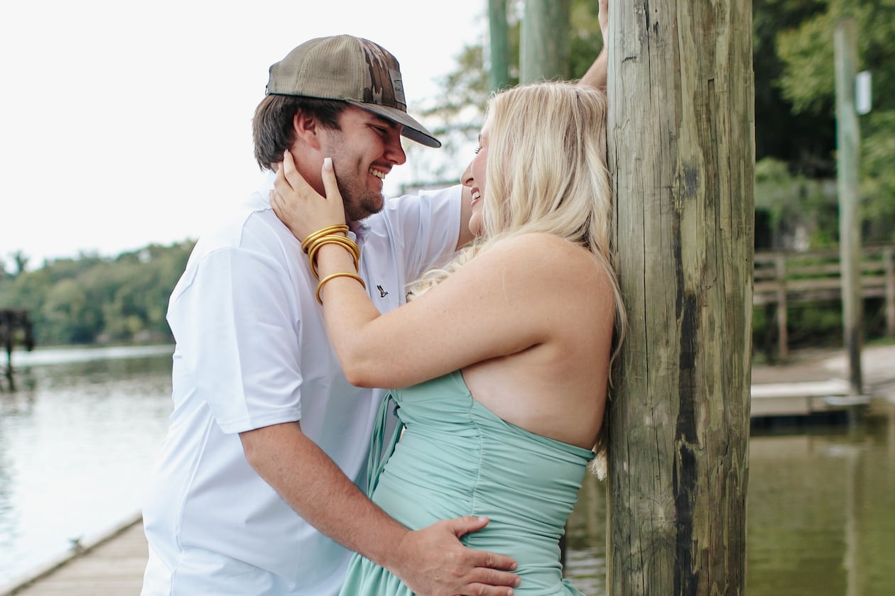 Hunter Bratcher (left) poses with his match during a "stranger sessions" photo shoot, an experience designed to spark connection between two people who have never met. (Courtesy of Lanie Mae Co. Photography)