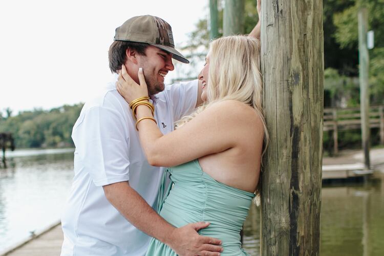 Hunter Bratcher (left) poses with his match during a "stranger sessions" photo shoot, an experience designed to spark connection between two people who have never met. (Courtesy of Lanie Mae Co. Photography)