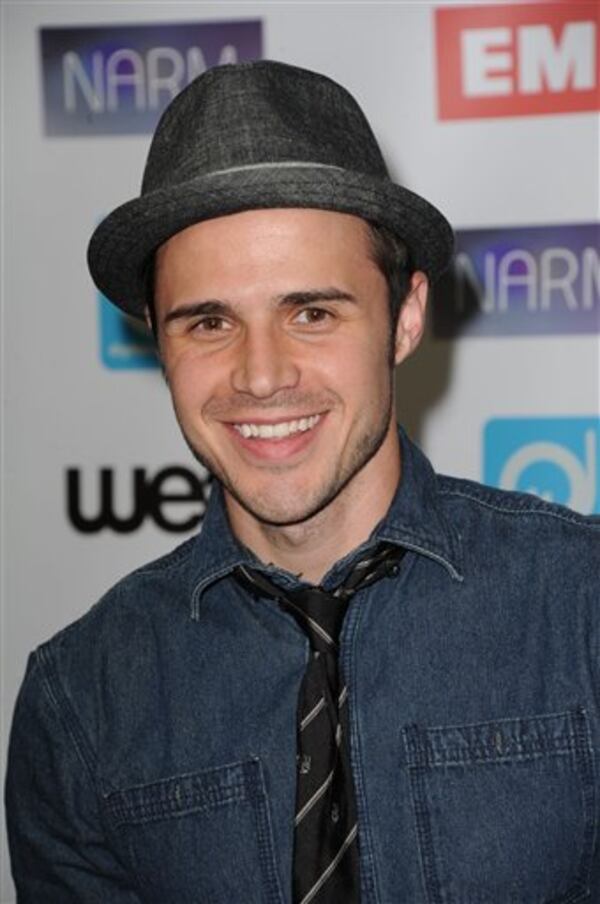 Kris Allen arrives at NARM Music Biz 2012 Awards, Thursday, May 10, 2012, at The Hyatt Regency in Century City, Calif. NARM (National Association of Recording Merchandisers) is the trade association for the business of music, spearheading the implementation of initiatives to promote music commerce, and advocating for common interests. (AP Photo/Katy Winn)