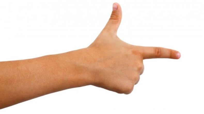 A 13-year-old Kansas girl has been charged with a felony for pointing a gun-like hand gesture at classmates.