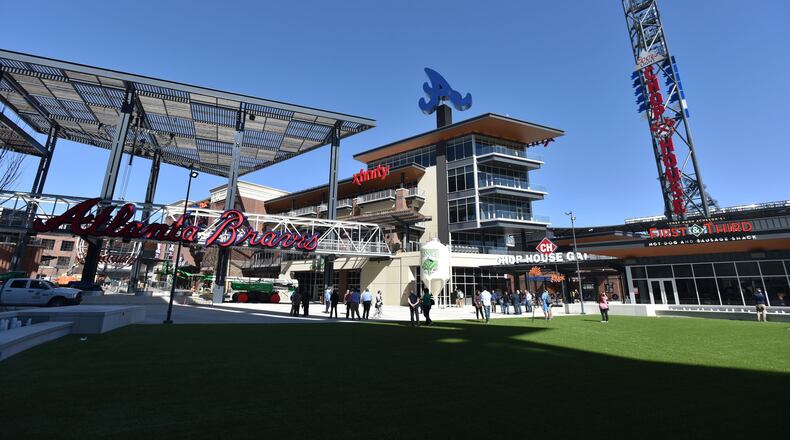 A view toward SunTrust Park from the plaza that connects mixed-use development The Battery Atlanta to the ballpark. HYOSUB SHIN / HSHIN@AJC.COM